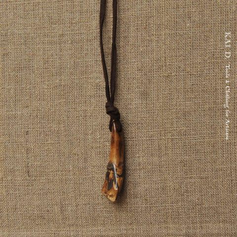 African Pendant - Cow Tooth